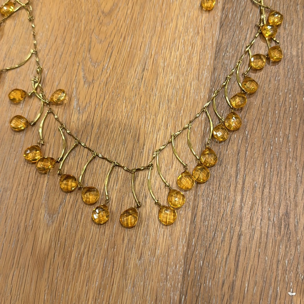 BCBGMaxAzria long gold necklace with yellow stone drops